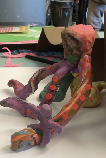 Prototype 1 — a clay octopus figure on a paper set of Vågmästareplatsen